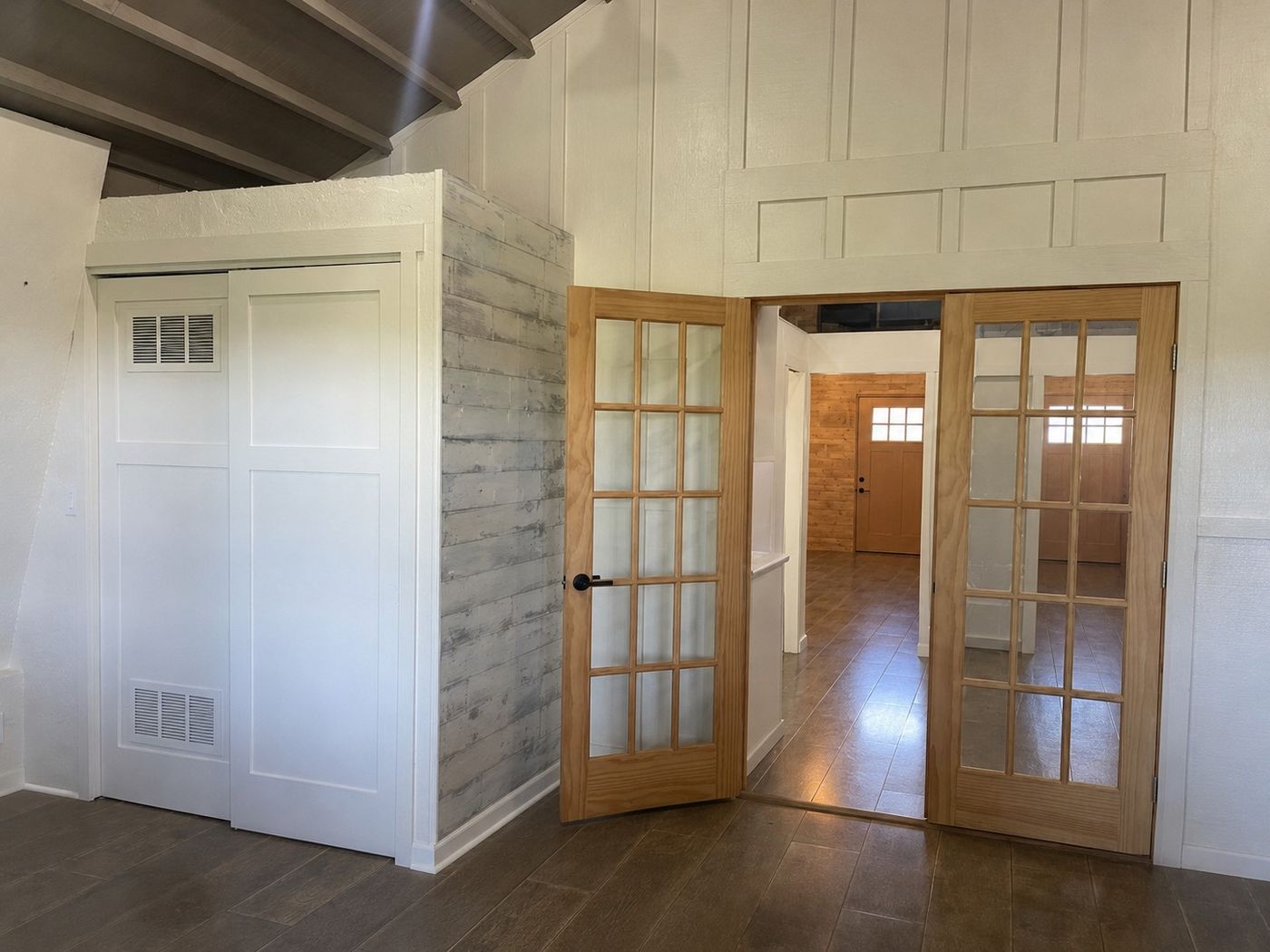 Laundry closet with stackable washer and dryer, from Bedroom 3